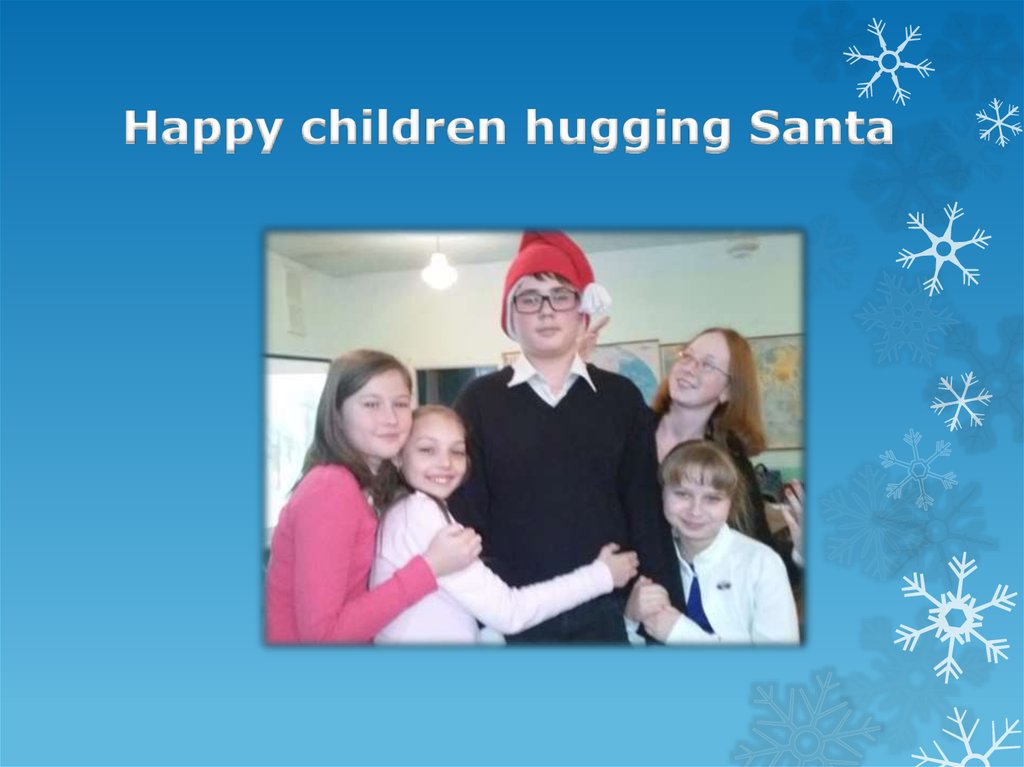 Happy children hugging Santa